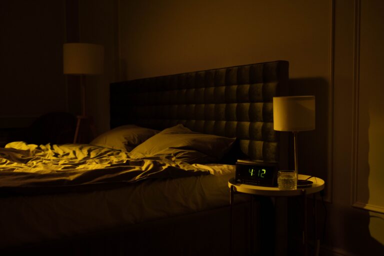 An unmade bed at night, the hours after everyone else has gone to sleep